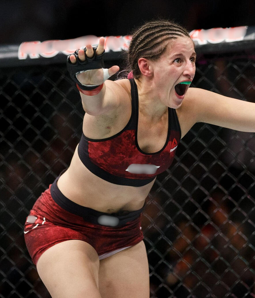 Sarah Moras Sarah Moras, former UFC fighter, owner and head coach of THE MMA FARM celebrating her win in the octagon.